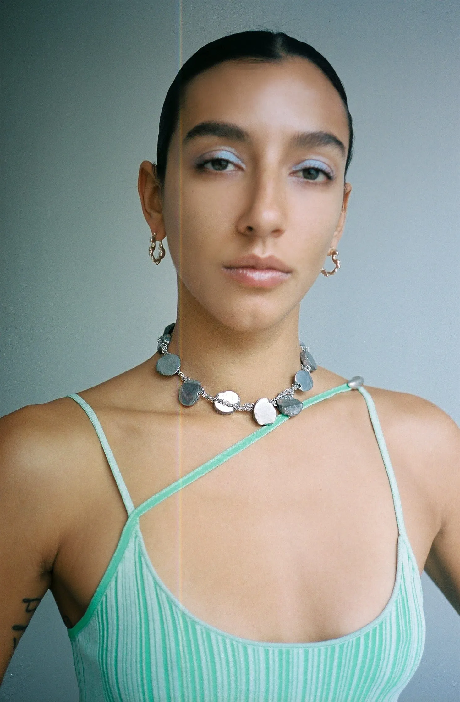 Green Asymmetric Singlet